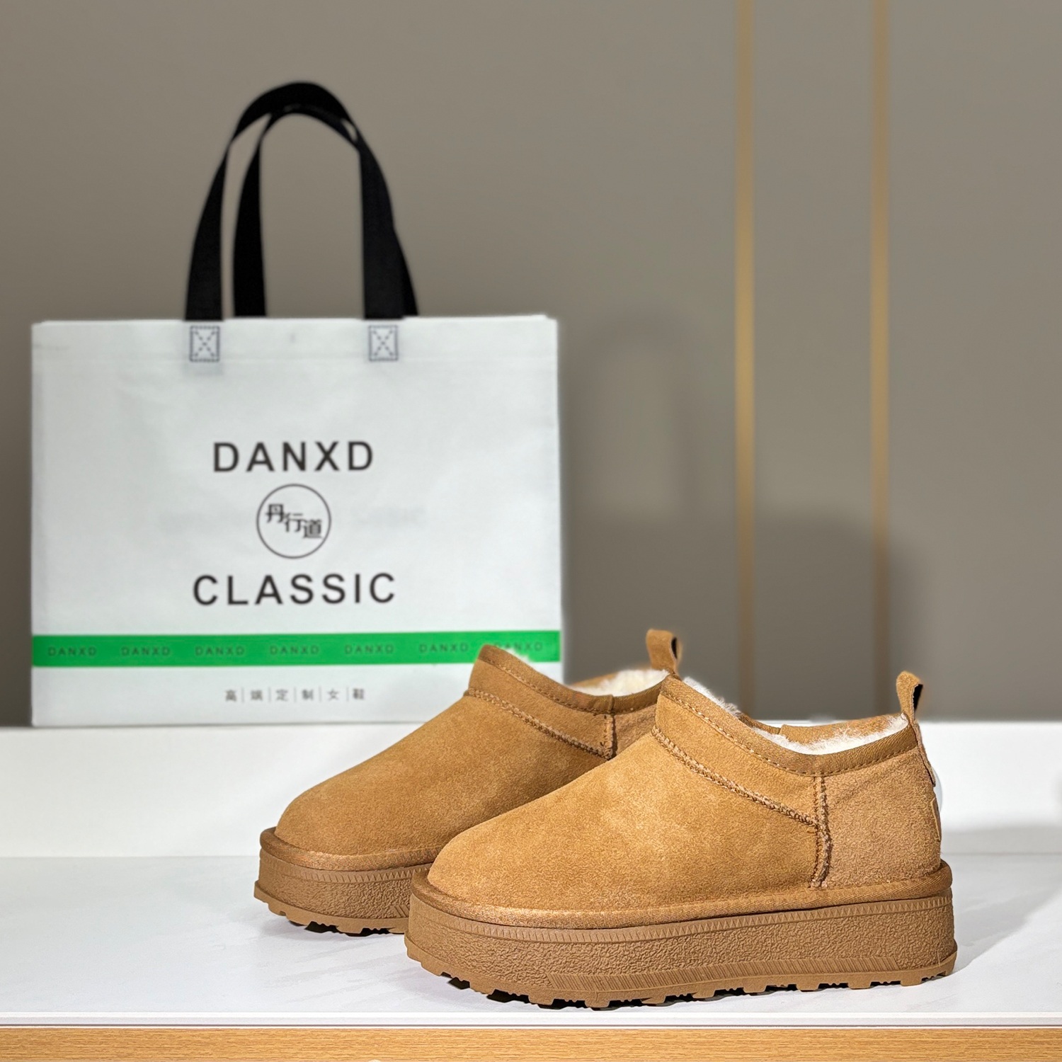 丹行道真皮毛一体厚底短筒雪地靴