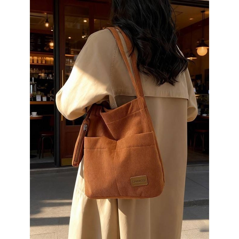 官方品牌大容量背包水桶包复古2025春季条绒单肩包时尚斜挎包便携,箱包皮具/热销女包/男包,时尚帆布包,淘宝优惠券,粉丝福利购,淘宝优惠卷