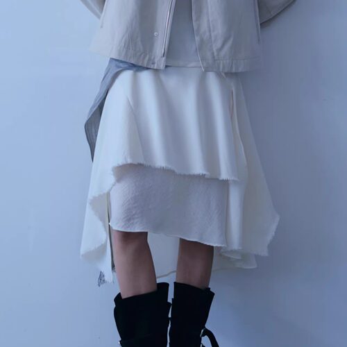 verso 26春夏 设计感毛边下摆不规则拼接裙边中长裙半身裙