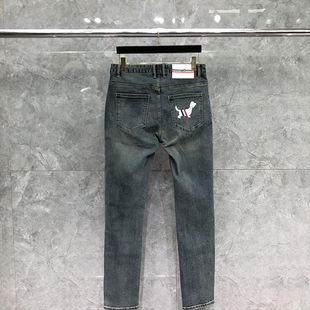 TB牛仔裤男高端夏季薄款红白蓝破洞小狗标修身水洗休闲牛仔长裤潮