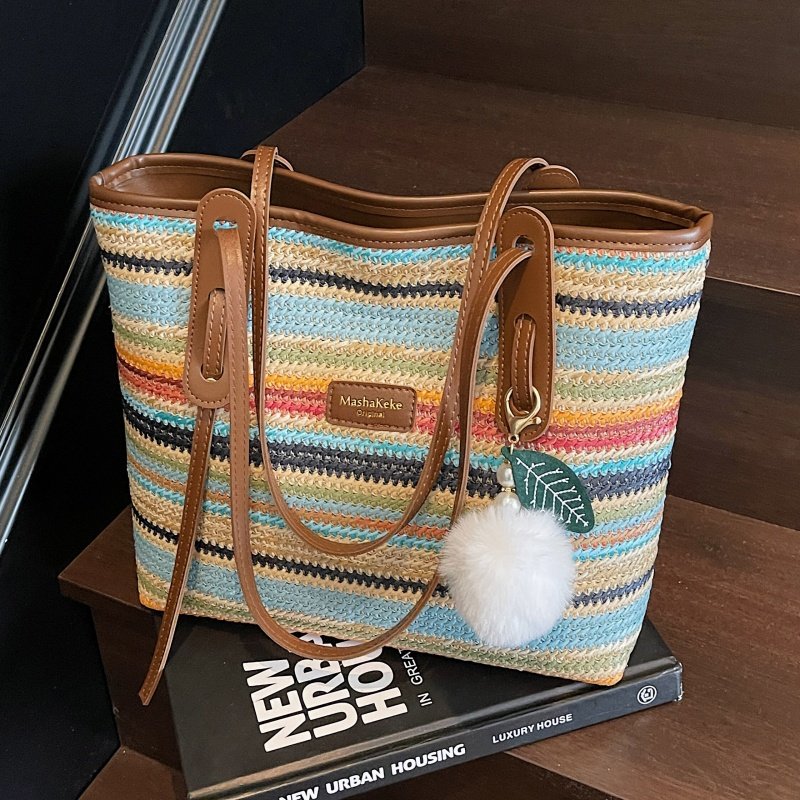 高级感超火彩虹编织包包女式2025新款单肩包大容量通勤草编托特包