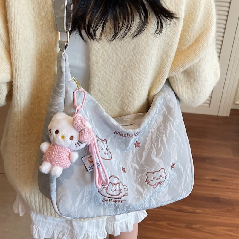 高级感单肩小众设计包包女式新款斜挎饺子包大容量通勤简约托特包