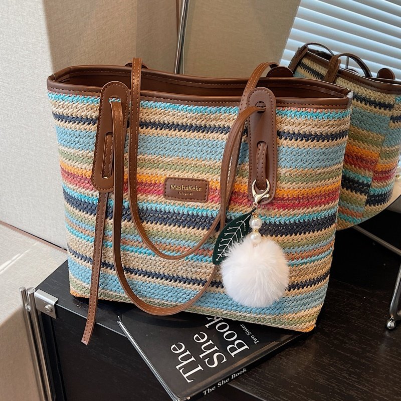 超火彩虹编织包包女2025新款高级感通勤百搭单肩大容量草编托特包