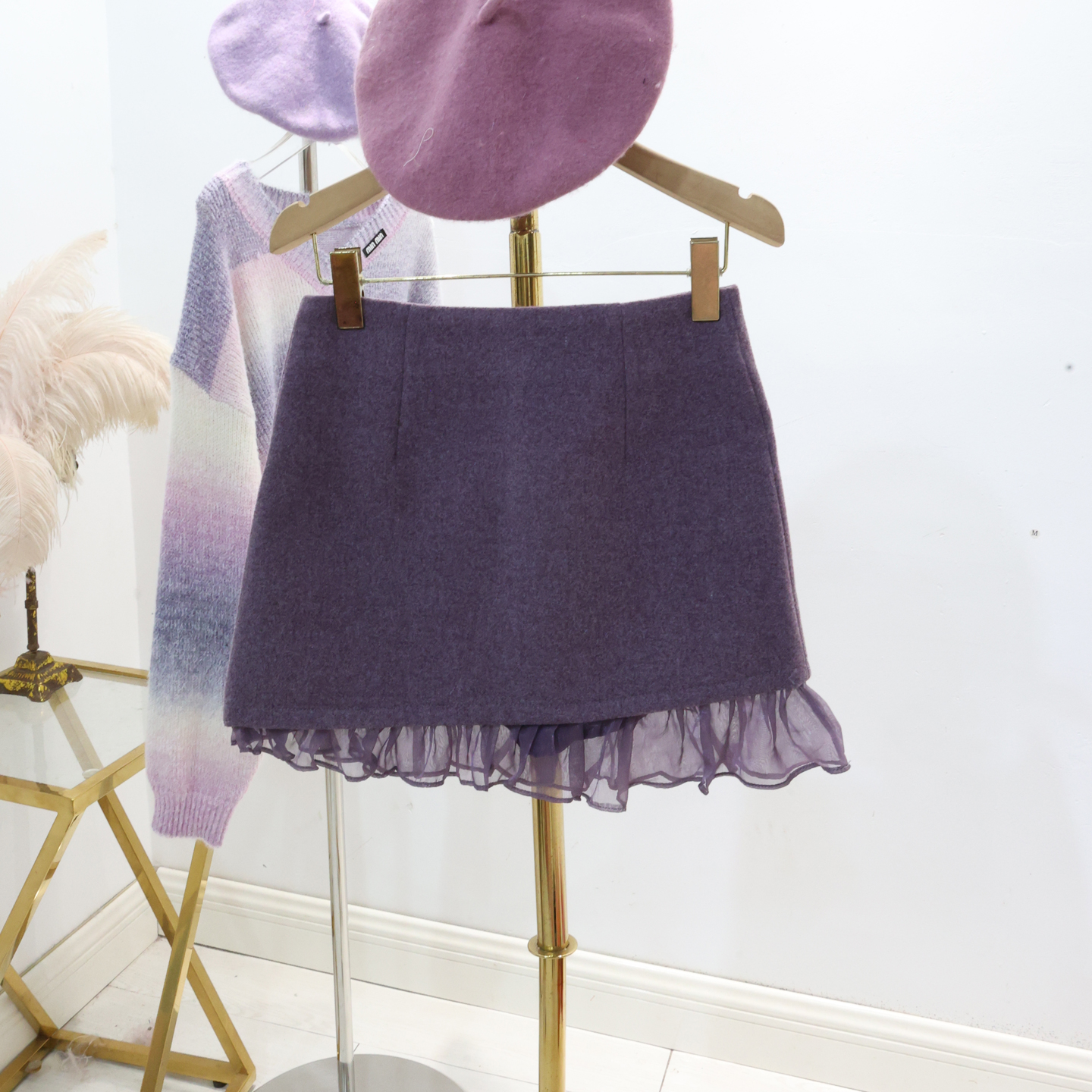 紫色高级毛呢半身裙2025法式优雅花朵拼接蕾丝设计感一步A版短裙