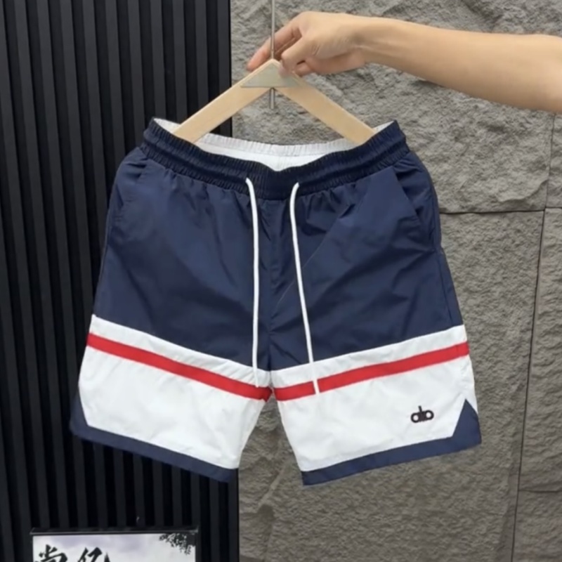 夏季潮牌撞色拼接冰丝速干短裤男
