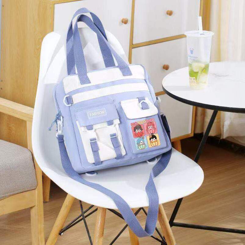 查九墨多多谜境冒险动漫周边单肩斜挎包男女初中小学生上课补习袋