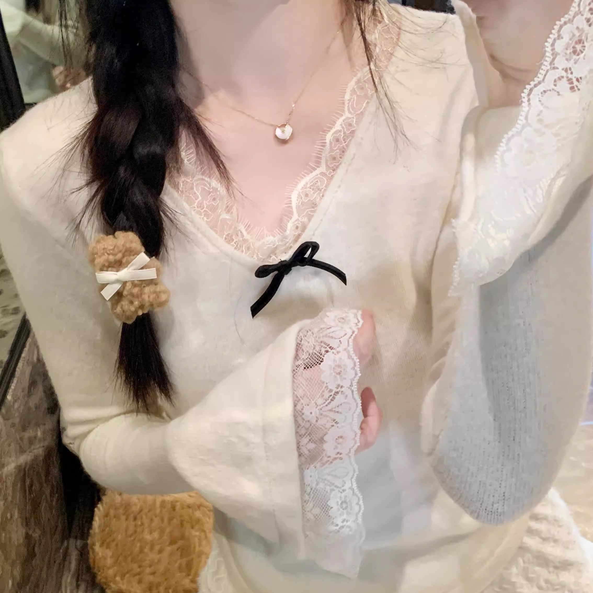 蝴蝶结针织打底衫游小姿新款