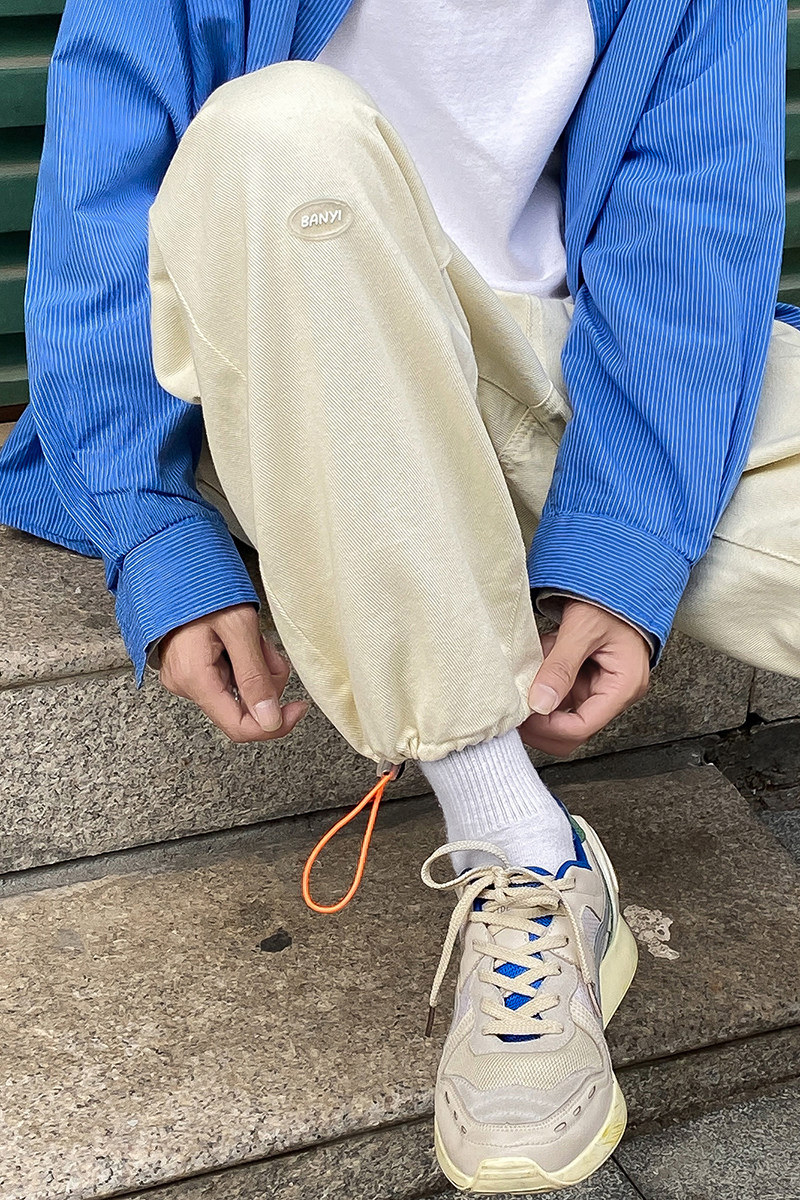 2021贴标牛仔裤男直筒宽松裤子韩版潮流束脚休闲长裤K105TP45控58,男装牛仔裤,电商A102B