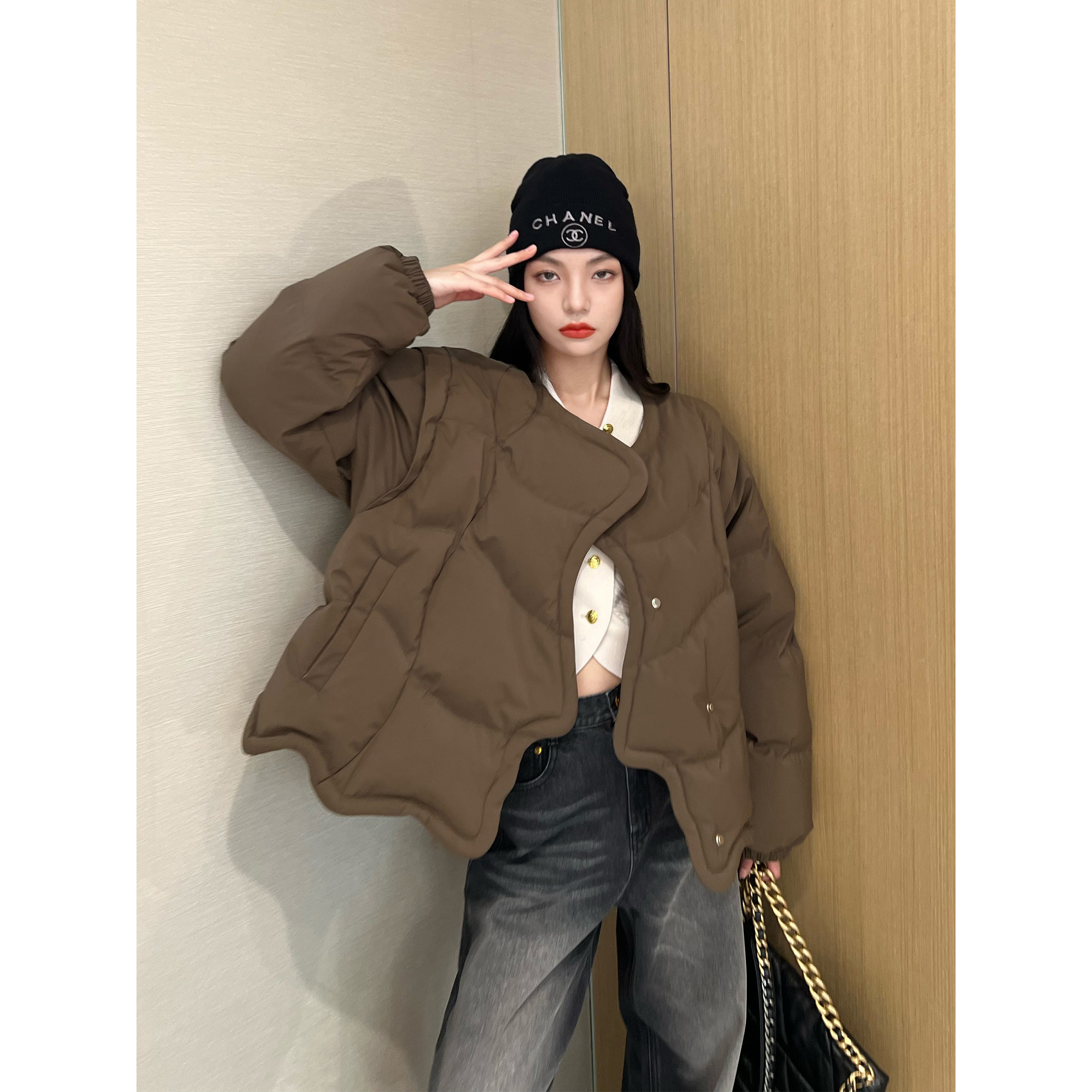 NancyCavally侧脸曲线门襟羽绒服