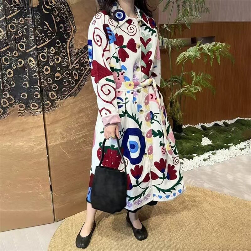 亏清丹麦设计春秋重工镂空凤尾镂空刺绣圆领不规则下摆衬衫女外套