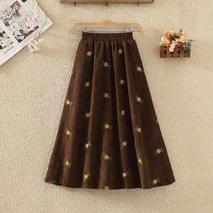 复古灯芯绒口袋半身裙女秋冬新款高腰刺绣碎花裙子中长款a字伞裙