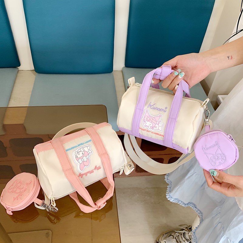 新款帆布小水桶百搭可爱美乐蒂软萌斜跨手提收纳化妆单肩包女包