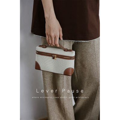 焦糖角贴拼皮单肩斜挎手提饭盒包