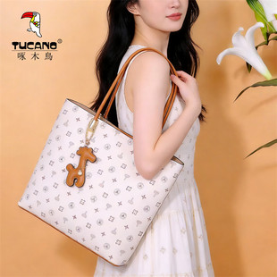 啄木鸟女包2026春季新款手提包通勤百搭大容量轻奢四季通用品牌