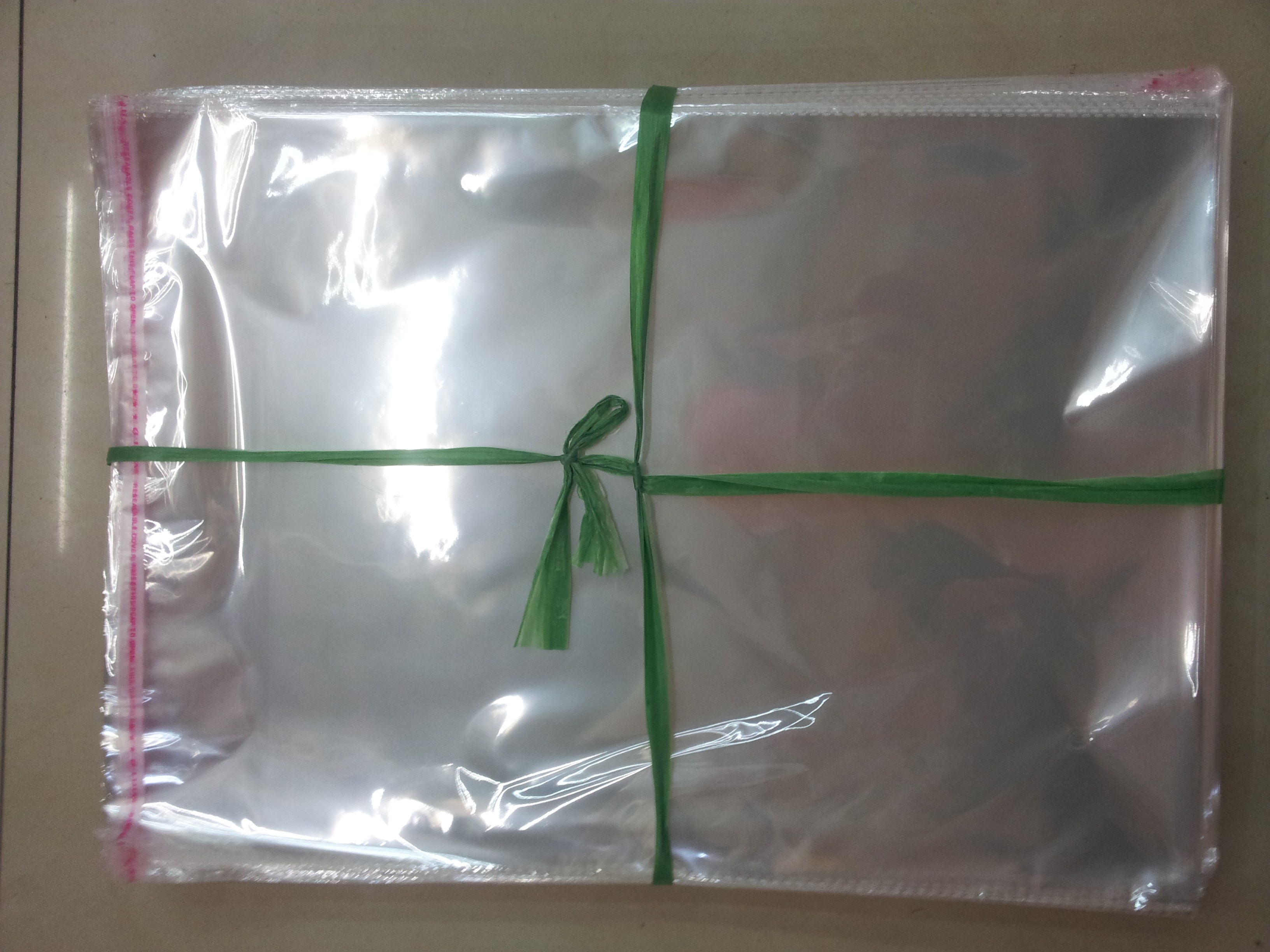 OPP袋子不干胶自粘袋塑料透明包装袋服装袋双面5丝22*34批发定做