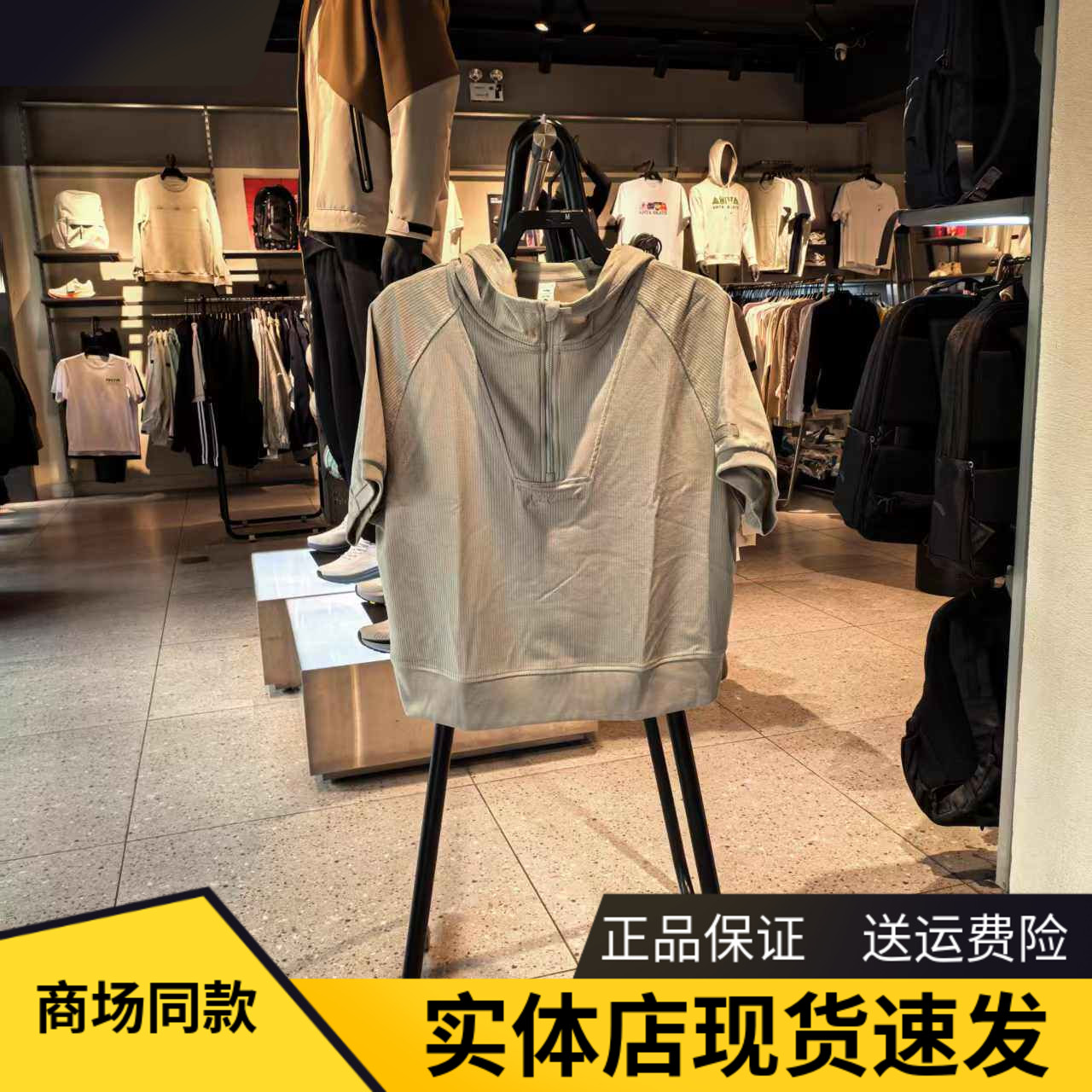 安踏25女休闲宽松连帽跑步短袖