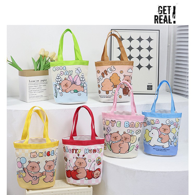 帆布水桶包可爱涂鸦手提圆桶