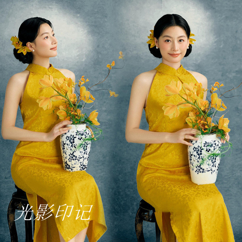 影楼龙年少女中国风黄色旗袍拍照