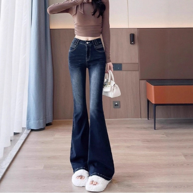 美式紧身微喇牛仔裤女2026年春季辣妹低腰做旧水洗马蹄拖地长裤子