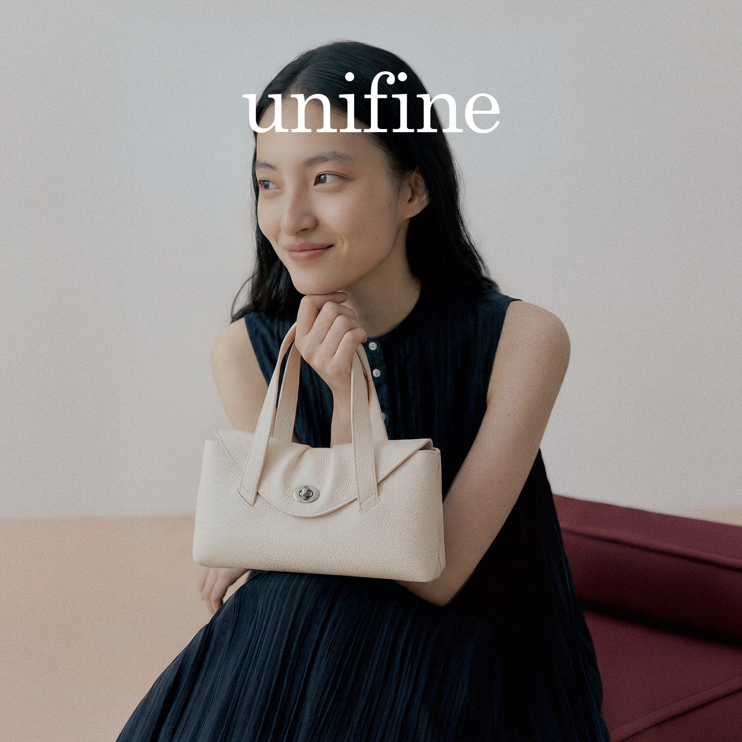 unifine小信封包头层牛皮手提包图片