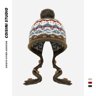 费尔岛民族风提花毛线帽子女冬季加厚保暖显脸小长辫针织帽毛球帽