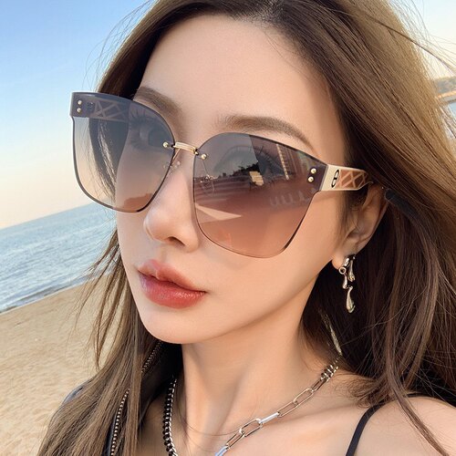 墨镜女防紫外线防晒素颜镜无框渐变太阳镜高级感大脸显瘦2026新款