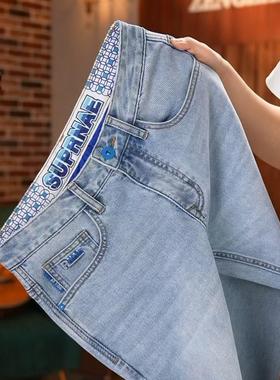 春夏新款男士高端牛仔裤钻石蓝水洗浅色弹力百搭小直筒九分长裤潮