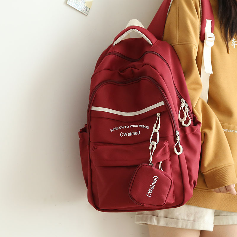 撞色学院风红色书包初中女生大学生双肩包女旅游轻便多层双肩背包