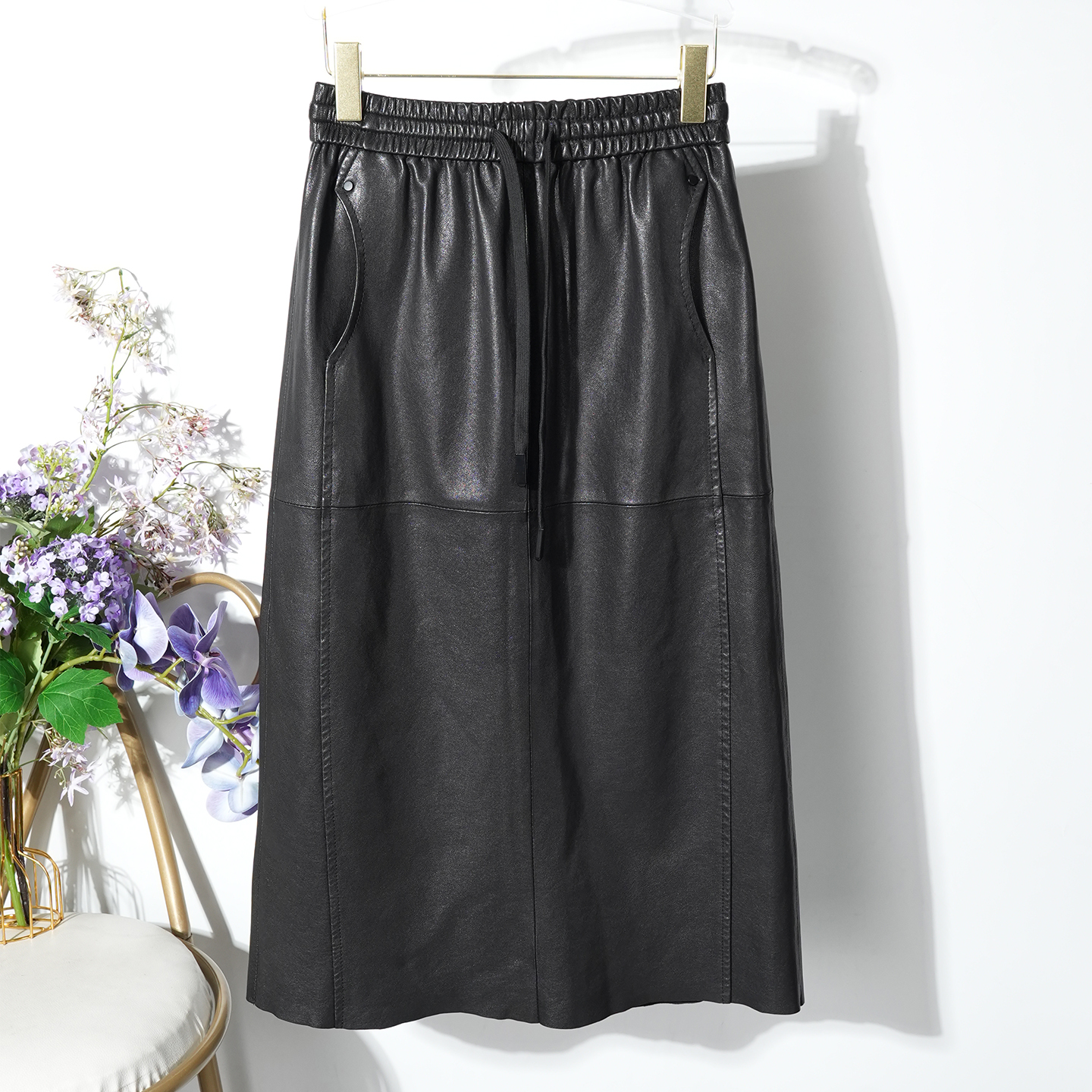 2025秋季抽绳松紧腰真皮半身裙女士高级感过膝长裙显瘦遮肚a字裙