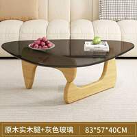 A modern and simple Nordic transparent and minimalist glass coffee table for home use in a small-sized living room. It is a creative round tea table by Isamu Noguchi thumbnail 7