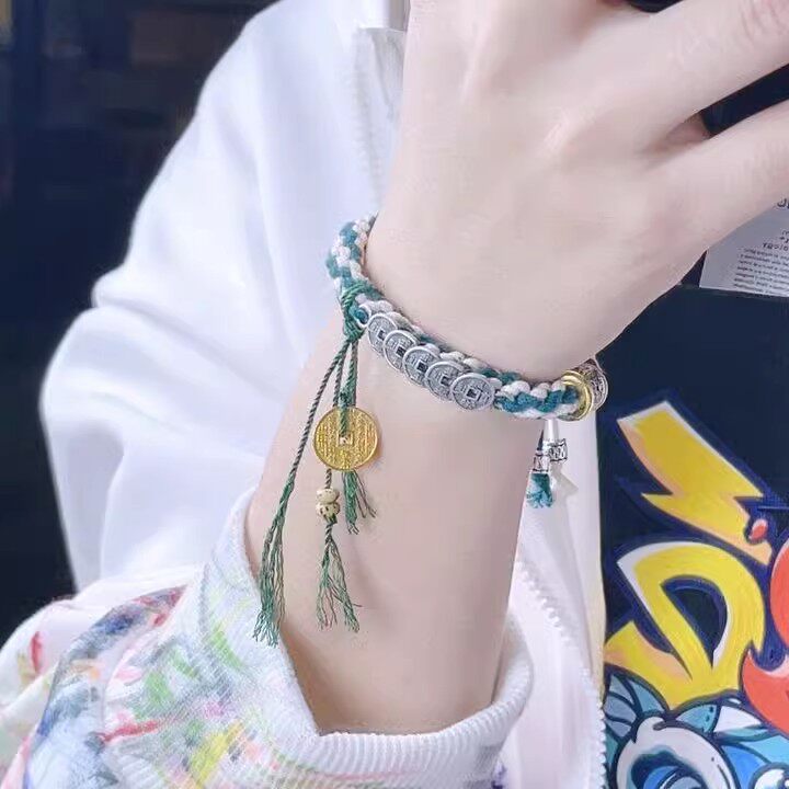 藏青绿色藏式民族风道系山鬼花钱