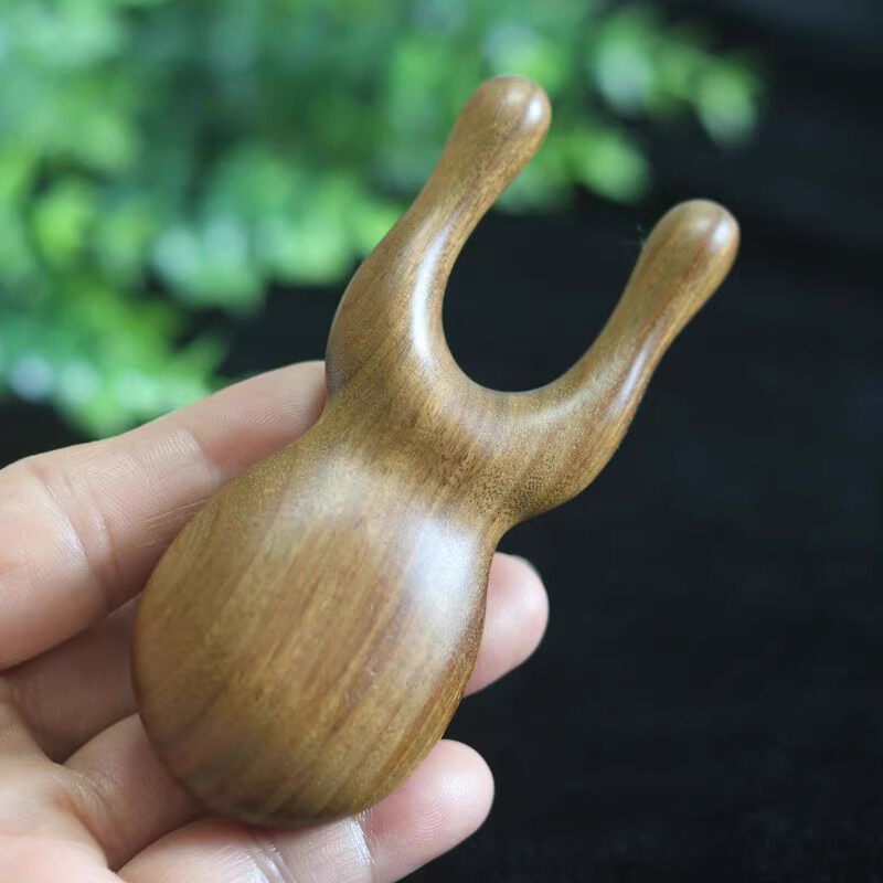 檀木眼周按摩器穴位经络按摩器图片