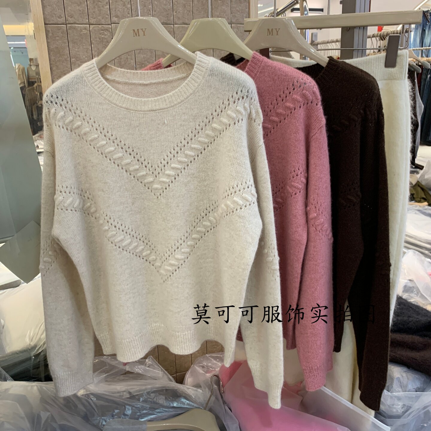 慵懒风镂空斜条显瘦女针织衫