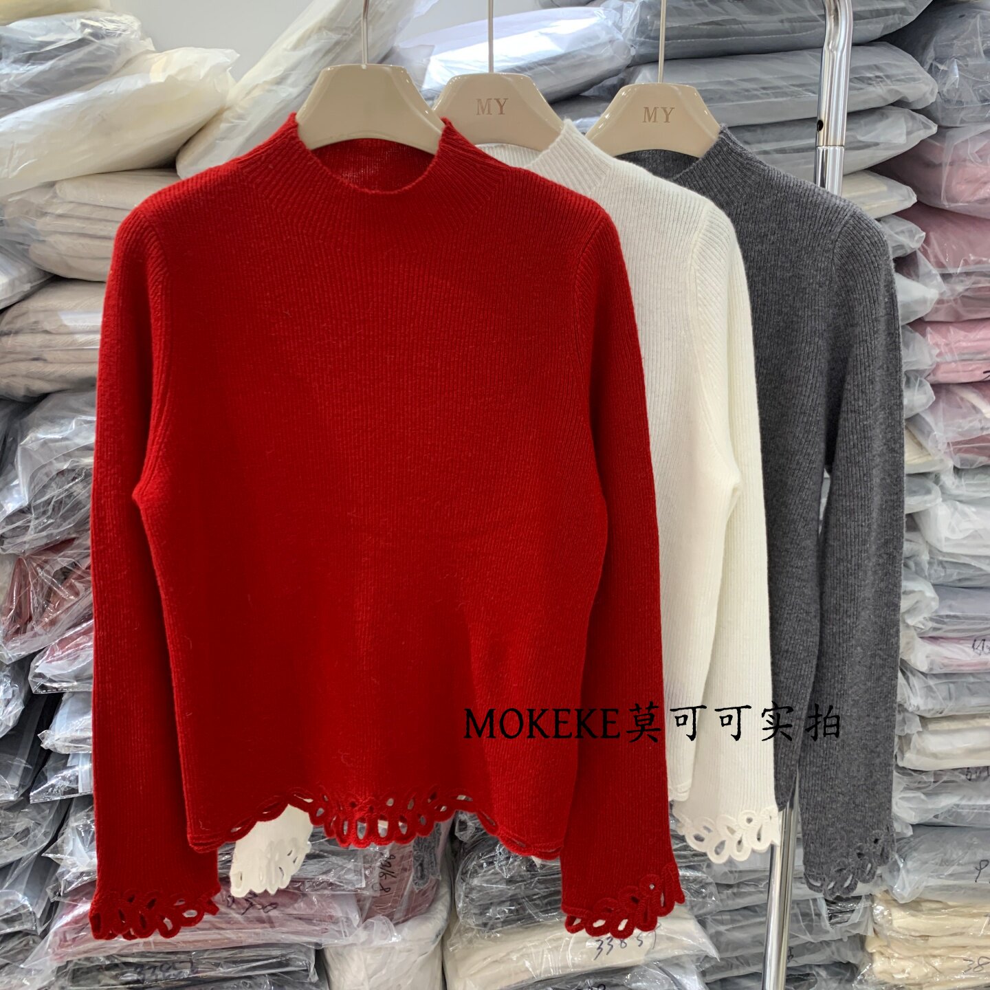 韩系绵羊毛立领镂空钩花女针织衫