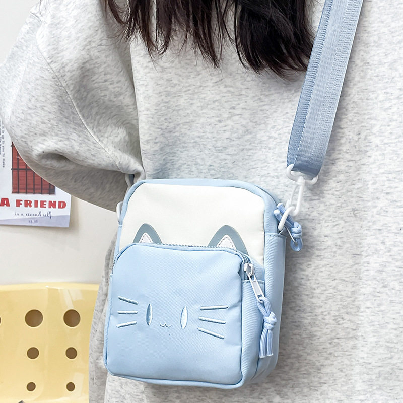 小包包女日系可爱猫咪学生斜挎包百搭出游手机包休闲小布包单肩包