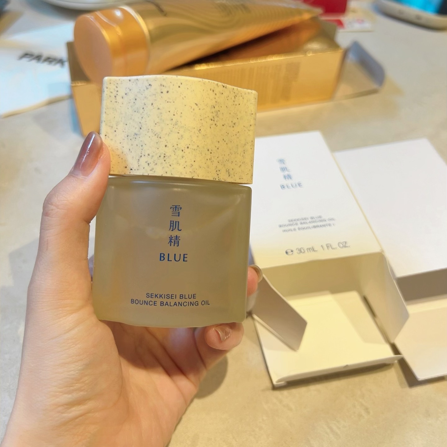 雪肌精BLUE气彩水精华面部精油30ml紧致淡纹修护保湿提亮不黏腻