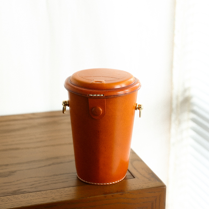 植鞣牛皮手机包女斜挎真皮水桶包