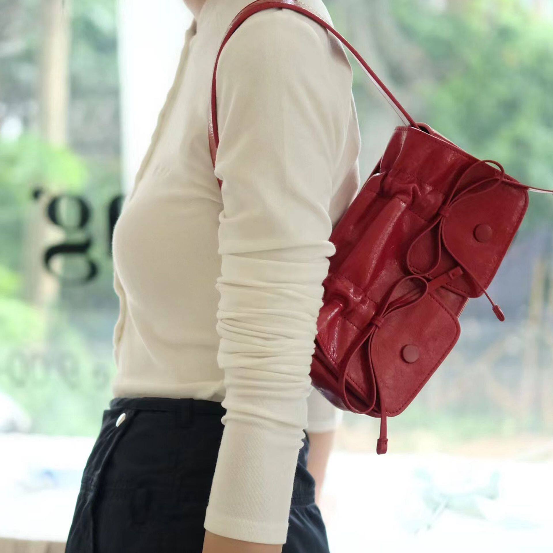 2026新款个性设计抽绳手提包单肩斜挎包韩版辣妹废土风多口袋包包