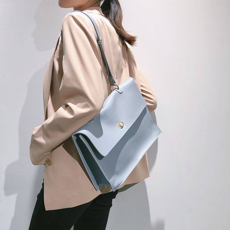 高级大容量女包包2025新款简约公文包电脑包百搭真皮职业通勤女包