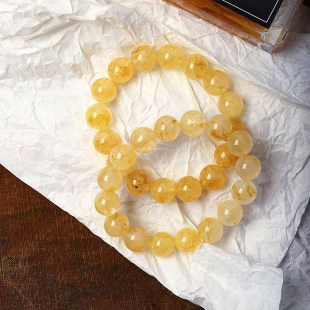 工厂处理福利价天然水晶黄胶花圆珠款 水晶手串饰品 单圈手链男女款