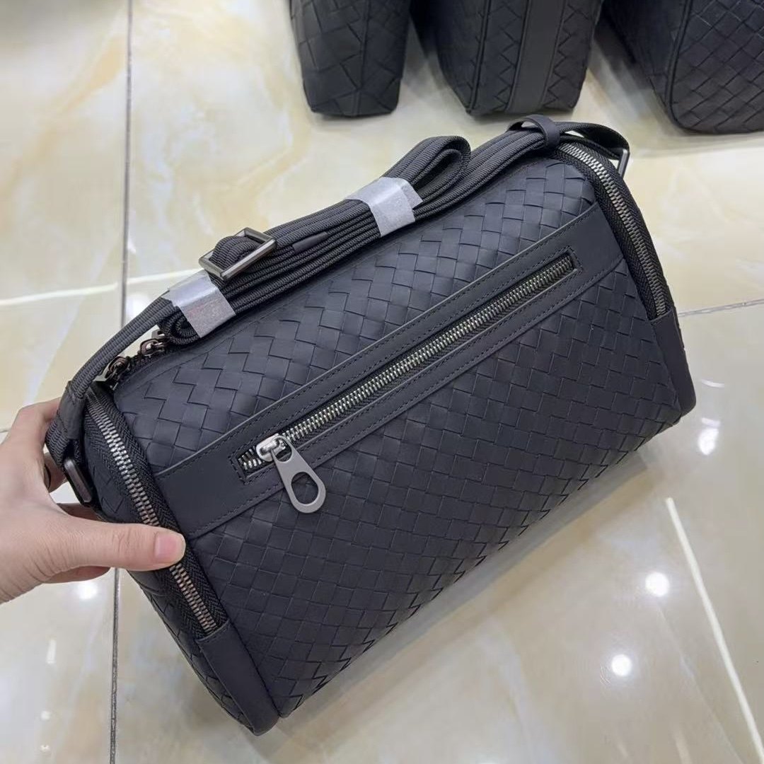 高品质单肩包新款2026男士编织斜挎包男真皮软皮手包商务休闲韩版