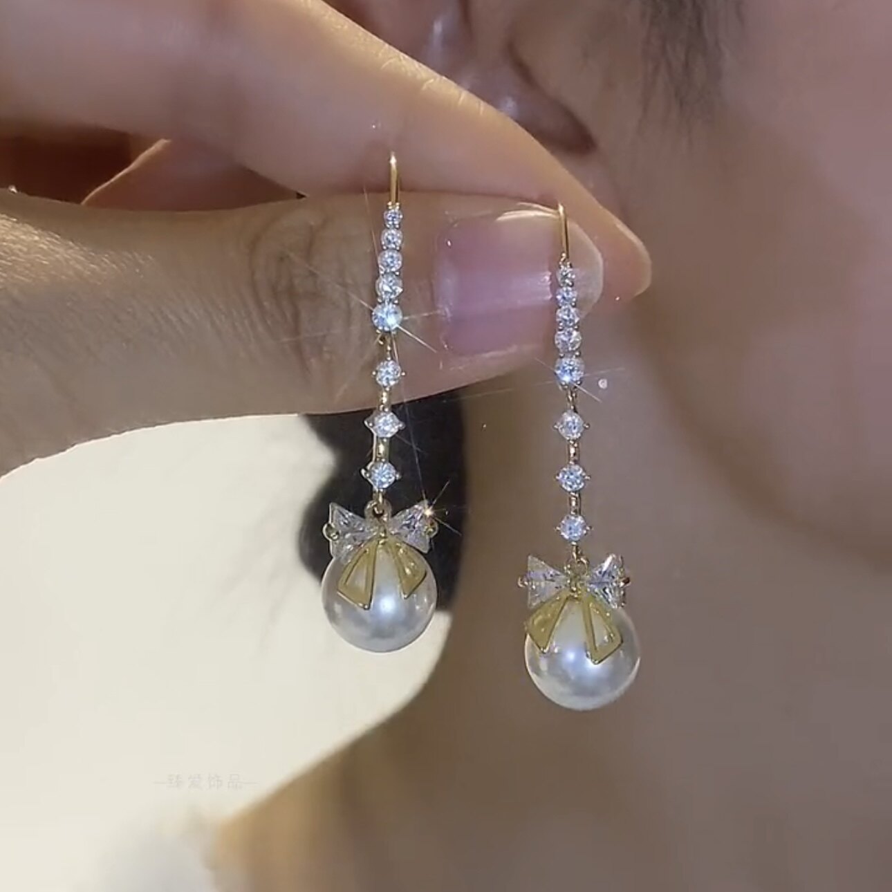 气质轻奢蝴蝶结珍珠流苏耳线女小众设计锆石水晶耳环超仙长款耳饰