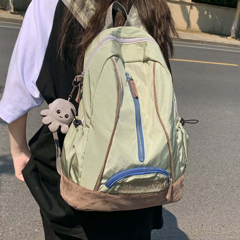 旅行通勤女轻便简约大容量双肩包