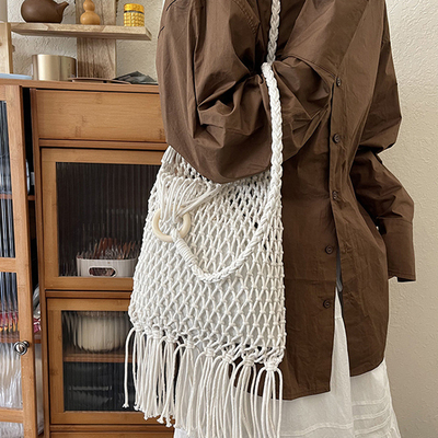 MUSTKOO/玛诗杜波西米亚风流苏编织大容量镂空休闲沙滩包MBAG-016