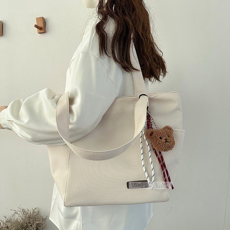 帆布包包女2025新款潮复古时尚单肩大包大容量轻便上课通勤托特包,箱包皮具/热销女包/男包,托特包,淘宝优惠券,粉丝福利购,淘宝优惠卷