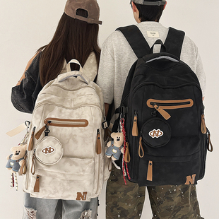 双肩包女2025新款初中生推荐大容量书包高中大学生通勤休闲男背包