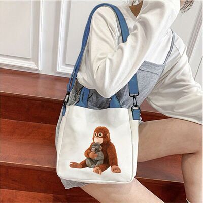 拳击猴印花学生斜挎包