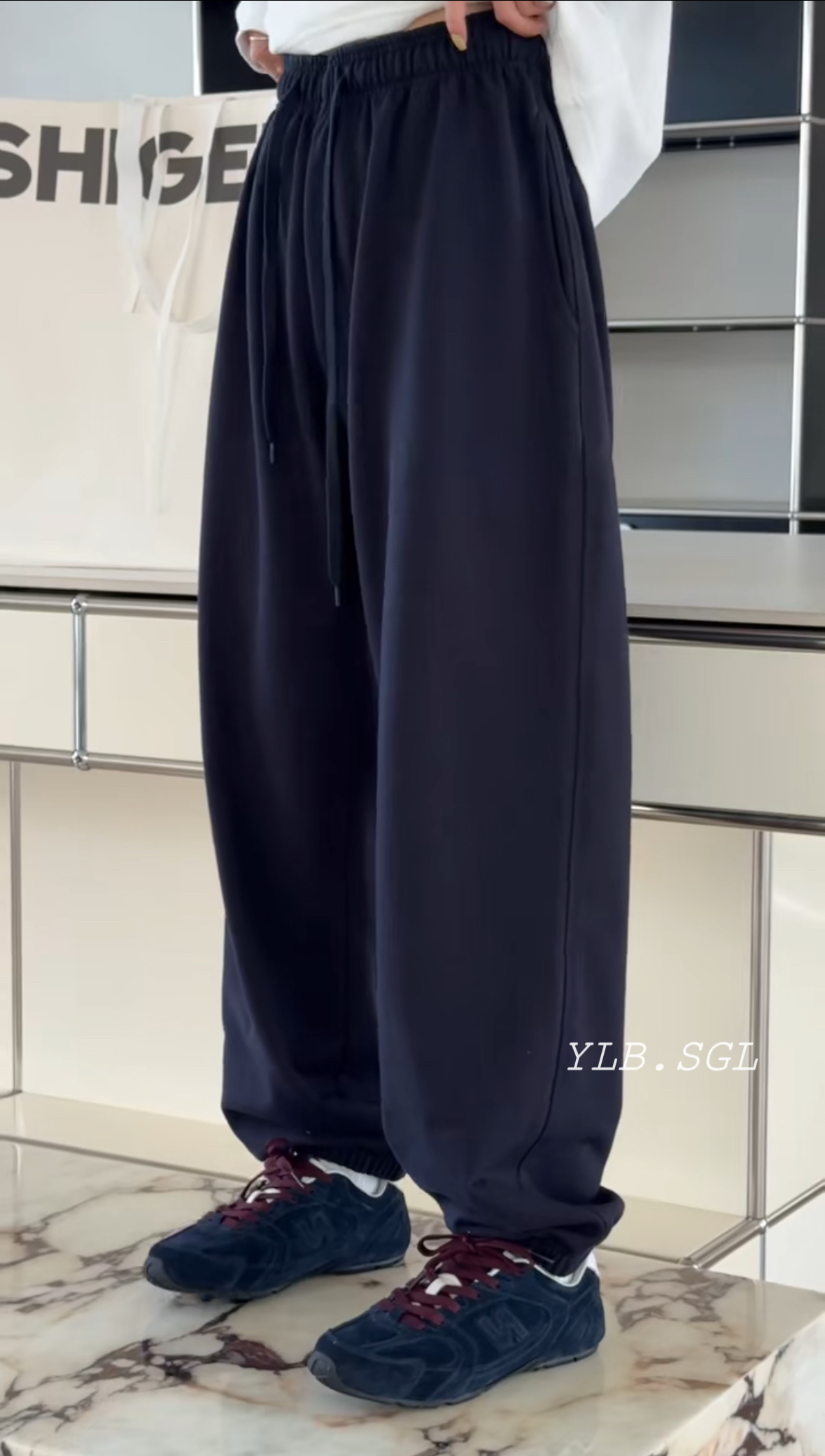 C58427诗歌兰休闲裤2025秋款 气质百搭深蓝色束脚裤收口卫裤女