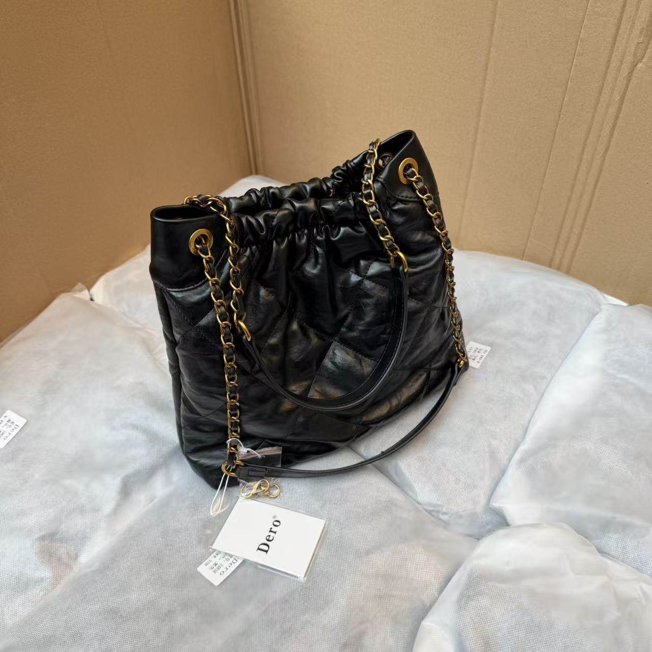 大厂出货！柜价500+！高级感软皮~经典菱格水桶托特流浪垃圾袋包,箱包皮具/热销女包/男包,托特包,淘宝优惠券,粉丝福利购,淘宝优惠卷