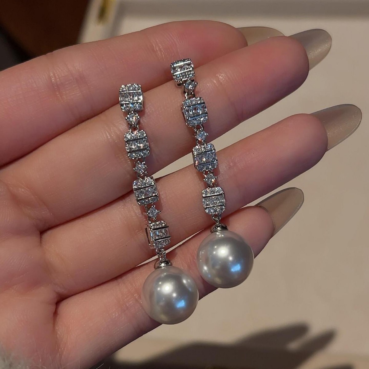 s925纯银精工银针冷光施家珍珠满钻长款流苏耳钉女轻奢风小众耳饰